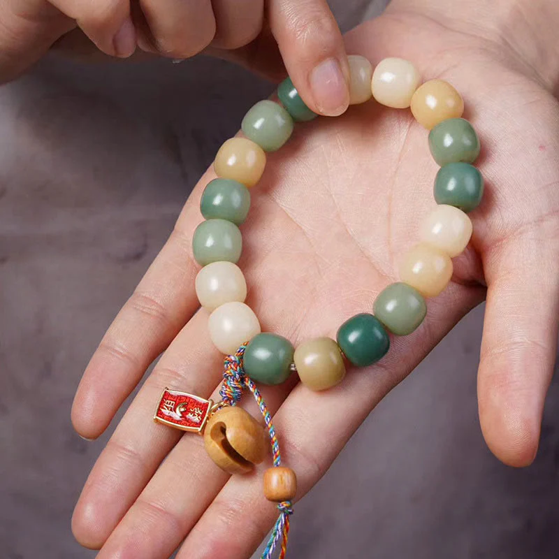 Braccialetto con ciondolo a tamburo di pesce in legno con semi di Bodhi e Buddha Stones, sfumatura naturale - Image 4