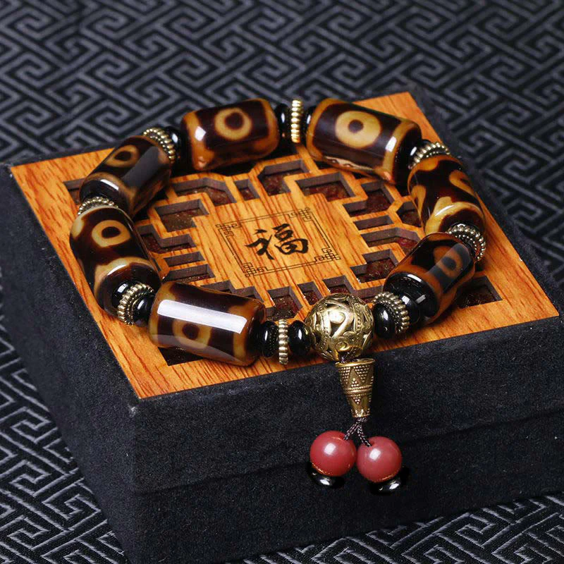 Braccialetto con ciondolo della fortuna con perline Dzi a nove occhi tibetani Buddha Stones
