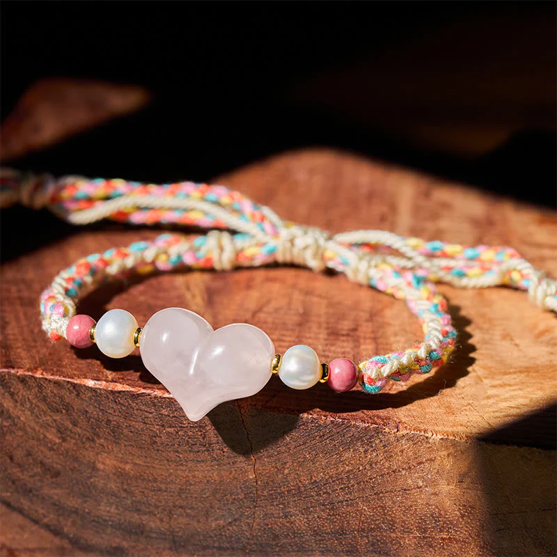 Braccialetto con corda intrecciata in cristallo rosa e design a cuore Buddha Stones e amore caldo