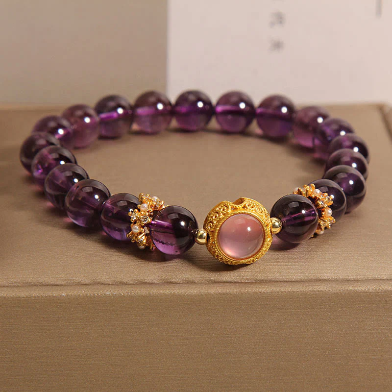 Braccialetto curativo con perle di quarzo fragola e ametista naturale Buddha Stones