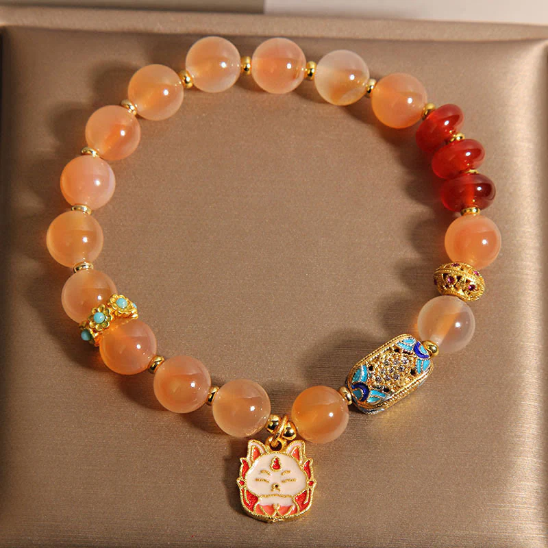 Braccialetto curativo in agata arancione caramellata naturale con volpe a nove code Buddha Stones - Image 5