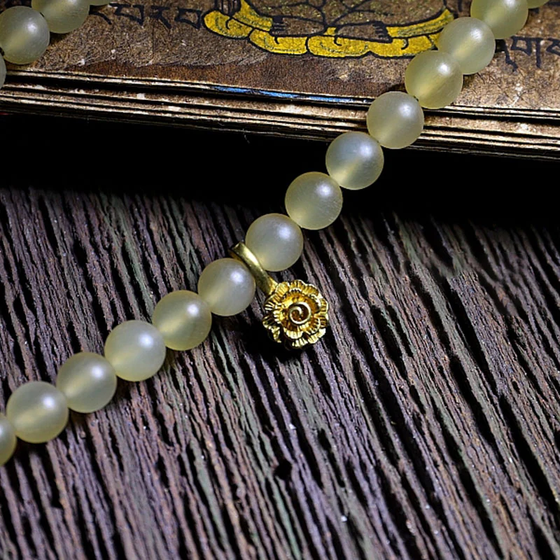 Braccialetto della fortuna in ambra e corno di pecora del Tibet con 108 perle di Mala Buddha Stones - Image 9