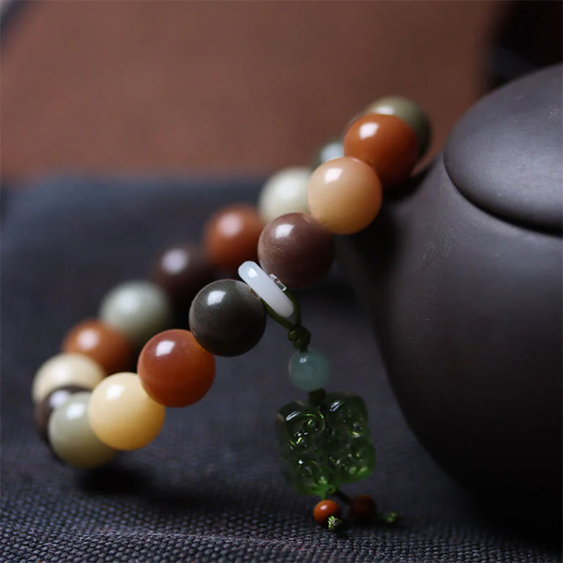 Braccialetto della pace con ciondolo in vetro Liuli con semi di Bodhi multicolore sfumato naturale Buddha Stones - Image 12