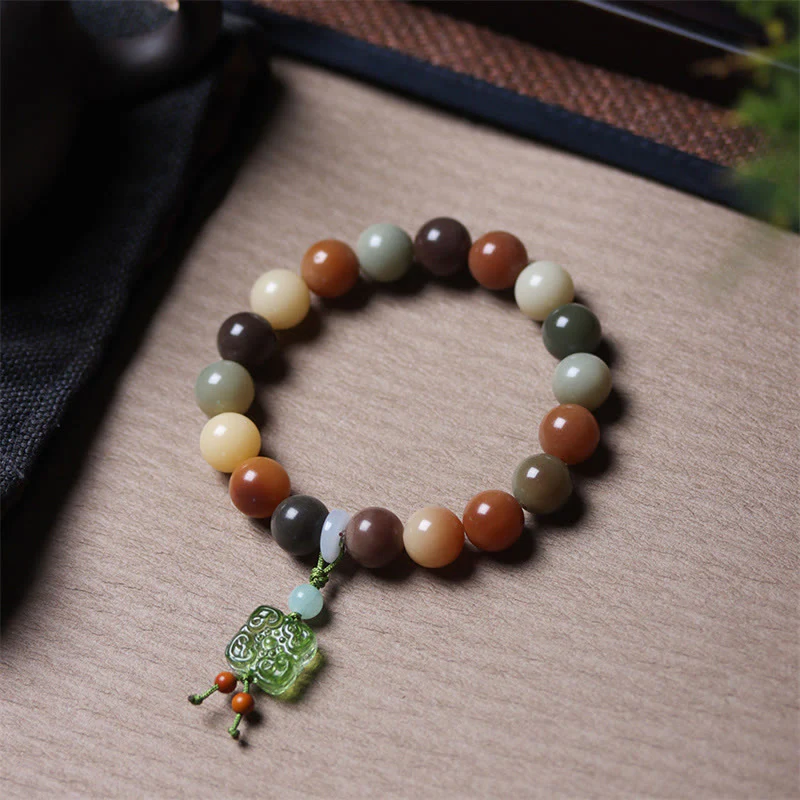 Braccialetto della pace con ciondolo in vetro Liuli con semi di Bodhi multicolore sfumato naturale Buddha Stones - Image 14
