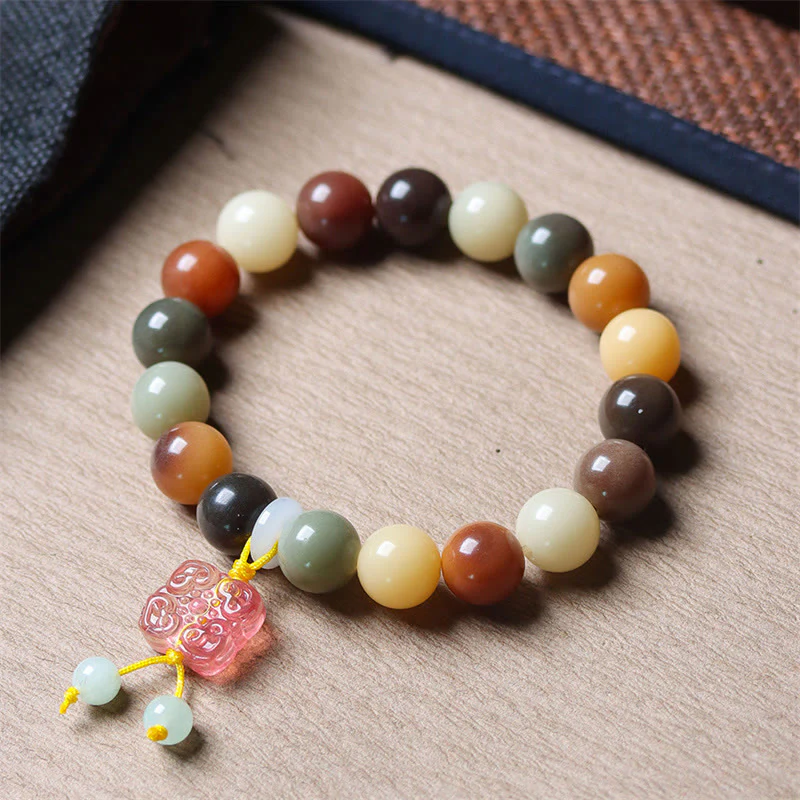 Braccialetto della pace con ciondolo in vetro Liuli con semi di Bodhi multicolore sfumato naturale Buddha Stones - Image 2