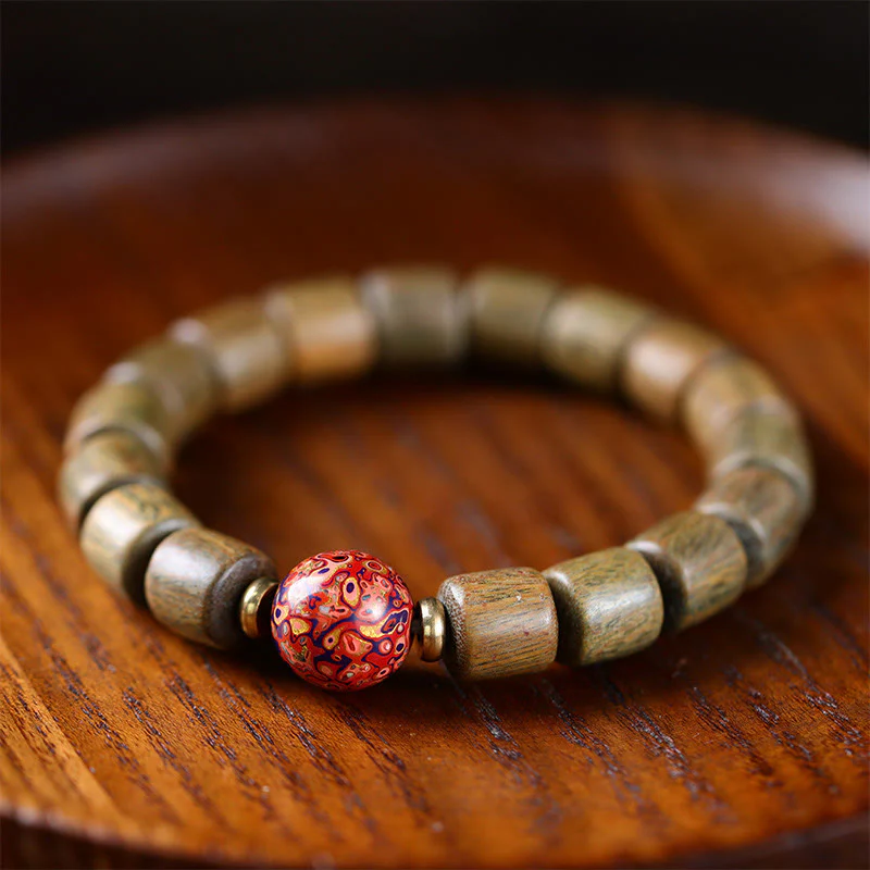 Braccialetto della pace con perline di lacca di sandalo rosso e piccole foglie di sandalo verde naturale Buddha Stones - Image 2