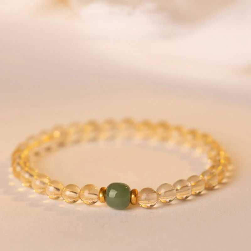Braccialetto della prosperità con piccole perle di giada citrina e Buddha Stones