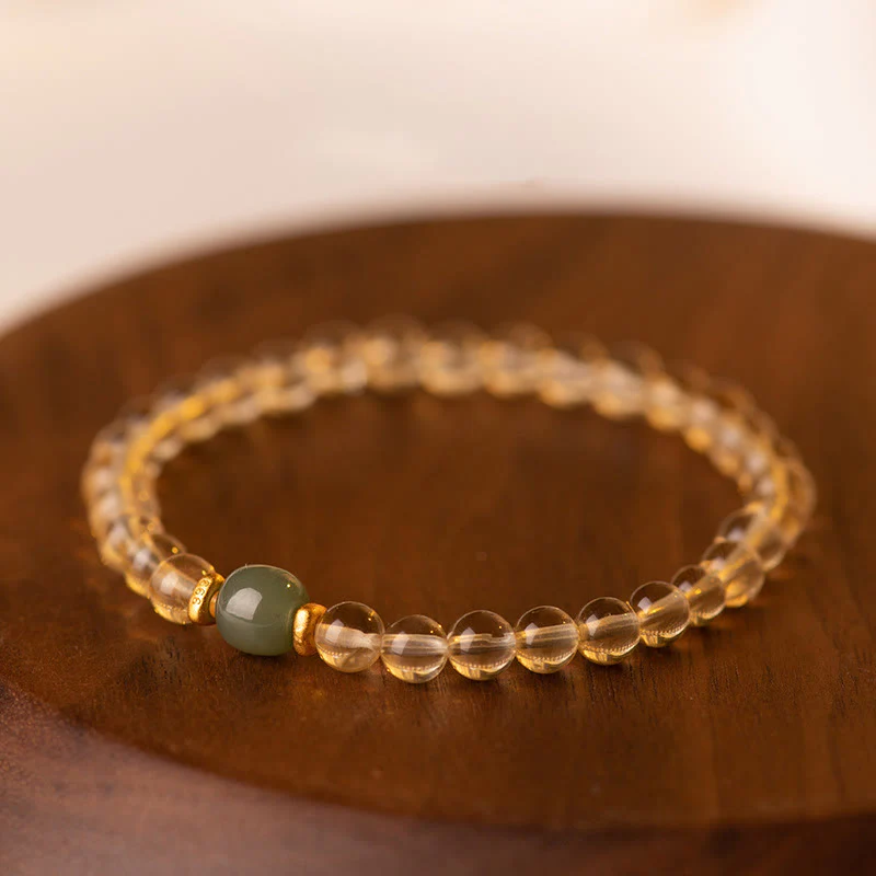 Braccialetto della prosperità con piccole perle di giada citrina e Buddha Stones - Image 2