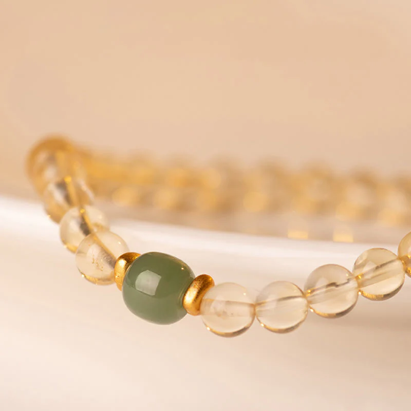 Braccialetto della prosperità con piccole perle di giada citrina e Buddha Stones - Image 3