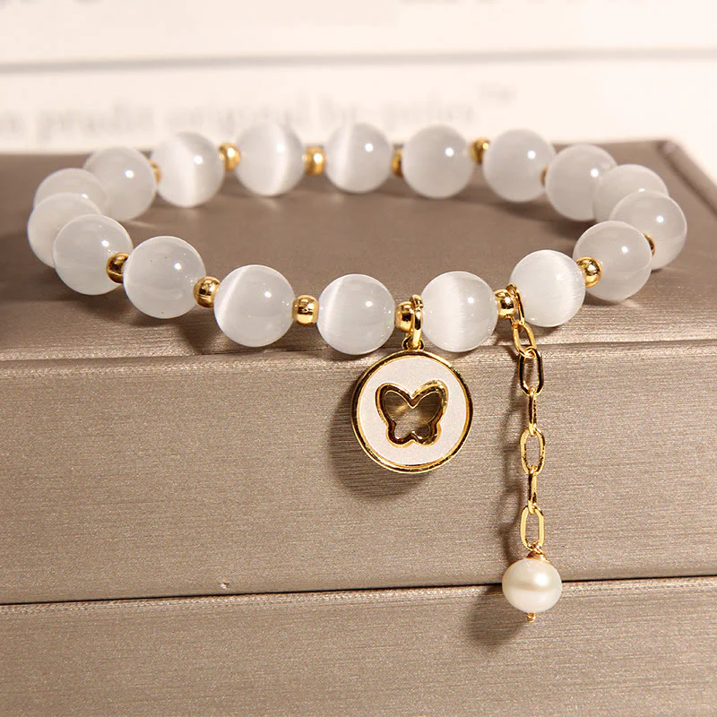 Braccialetto dell'amore con ciondolo a farfalla con occhio di gatto Buddha Stones