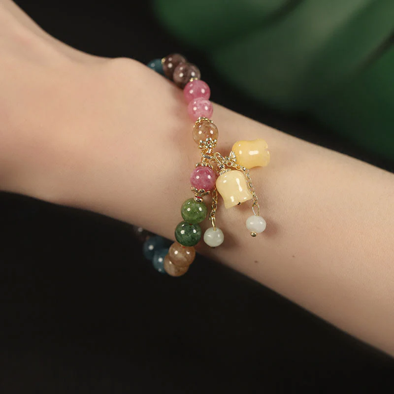 Braccialetto dell'amore con perline di fiori di tormalina colorata naturale Buddha Stones - Image 10