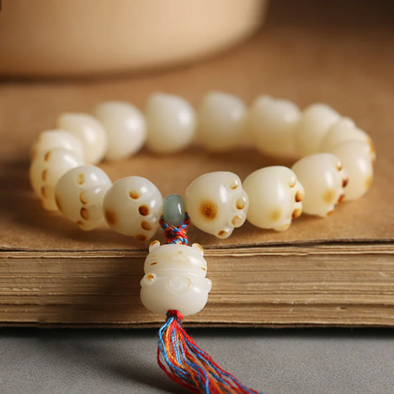 Braccialetto dell'armonia con zampa di gatto con semi di Bodhi e gatto fortunato Buddha Stones