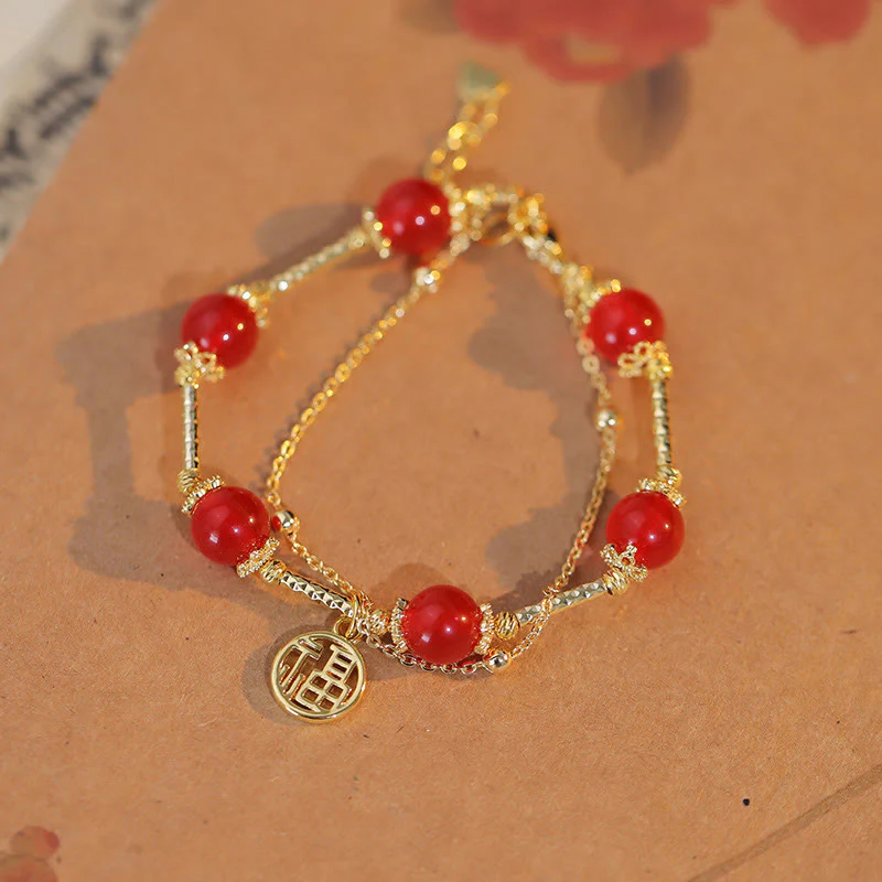 Braccialetto di accettazione di sé con ciondolo a forma di carattere Fu in agata rossa Buddha Stones