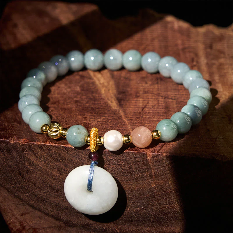 Braccialetto di buon auspicio con perline rotonde in giada e fibbia della pace Buddha Stones
