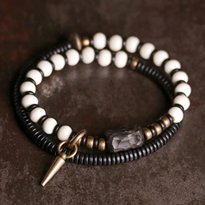 Braccialetto di coppia con perline di osso, ebano, Buddha Stones e rame - Image 2