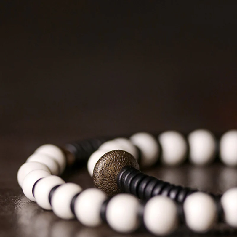 Braccialetto di coppia con perline di osso, ebano, Buddha Stones e rame - Image 9