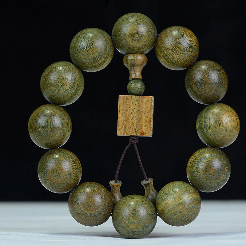 Braccialetto di cura in legno di sandalo verde tibetano Buddha Stones - Image 3