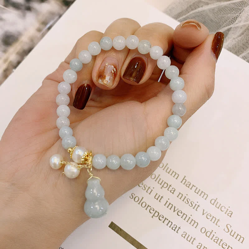 Braccialetto di fortuna e prosperità di zucca di perle di giada naturale Buddha Stones