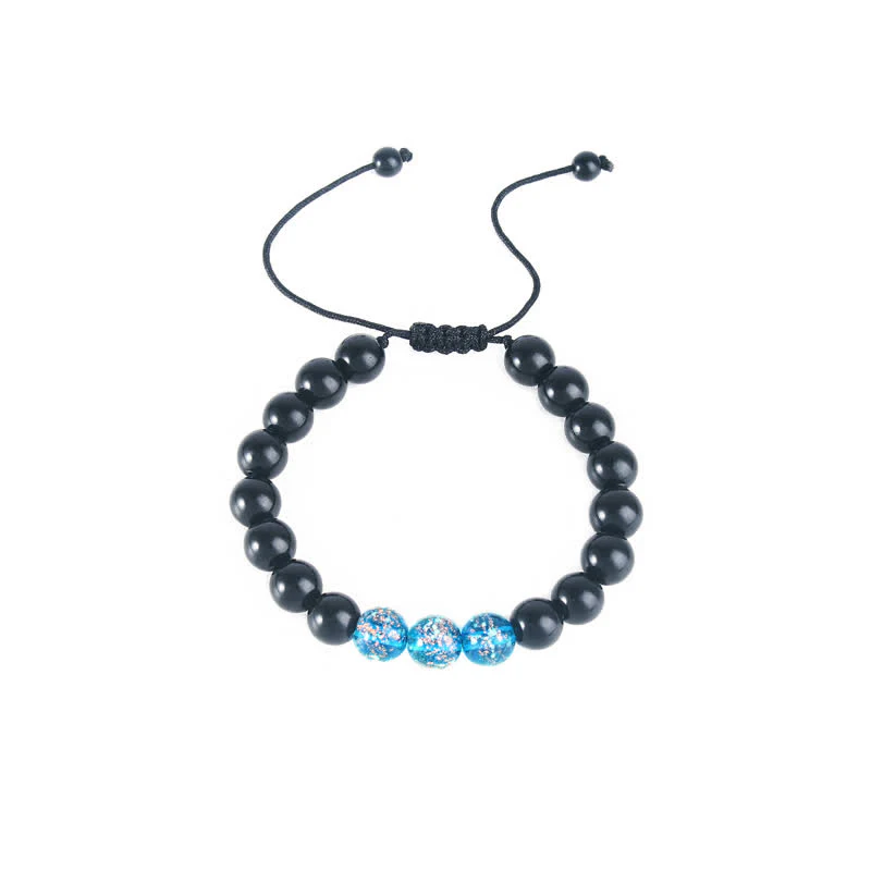 Braccialetto di forza in pietra luminosa con ossidiana nera Buddha Stones - Image 15