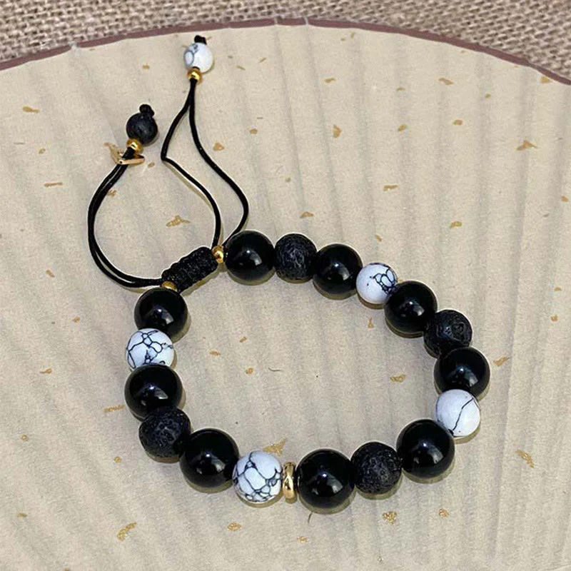 Braccialetto di forza Yin Yang in pietra lavica di ossidiana nera Buddha Stones - Image 10