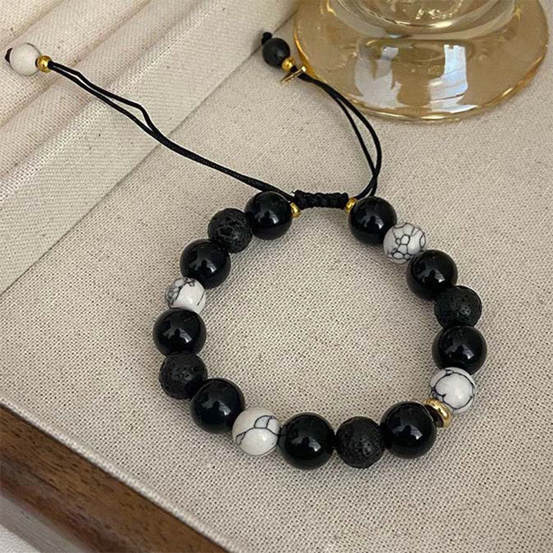 Braccialetto di forza Yin Yang in pietra lavica di ossidiana nera Buddha Stones - Image 11