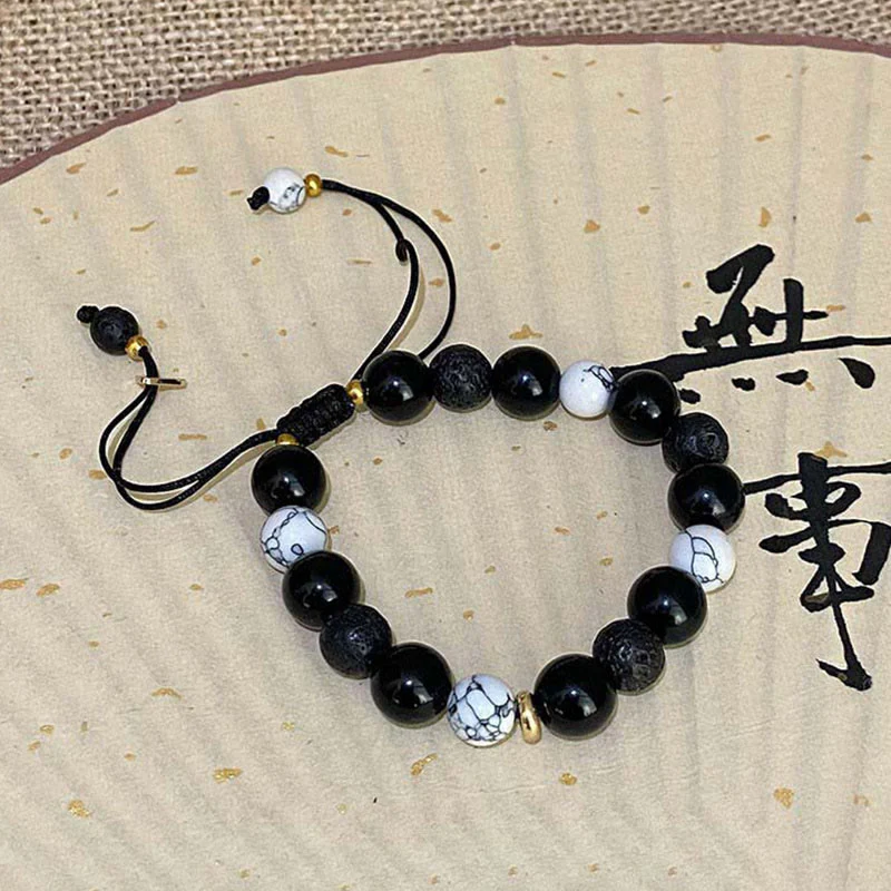 Braccialetto di forza Yin Yang in pietra lavica di ossidiana nera Buddha Stones - Image 12