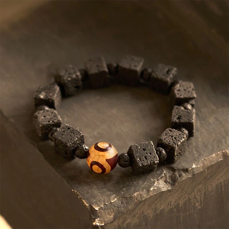 Braccialetto di guarigione con perline di Dzi e pietra lavica Buddha Stones
