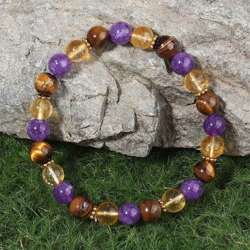 Braccialetto di guarigione con perline distanziatrici in Buddha Stones, ametista, occhio di tigre e citrino - Image 2
