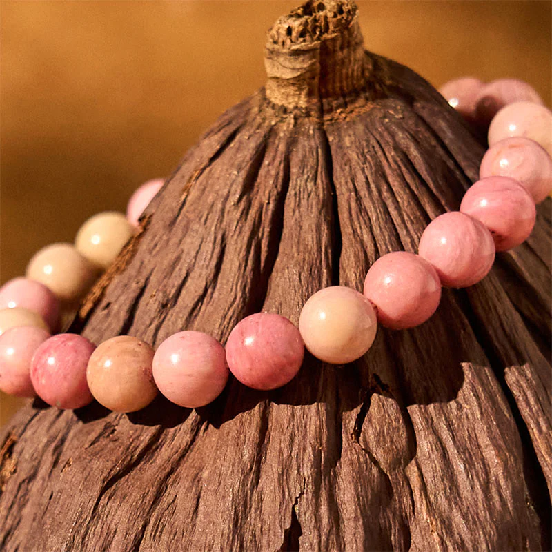 Braccialetto di guarigione delle relazioni Buddha Stones e rodonite - Image 3