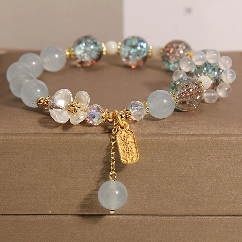 Braccialetto di guarigione naturale con fiore di calcedonio, ametista e cristallo blu Buddha Stones