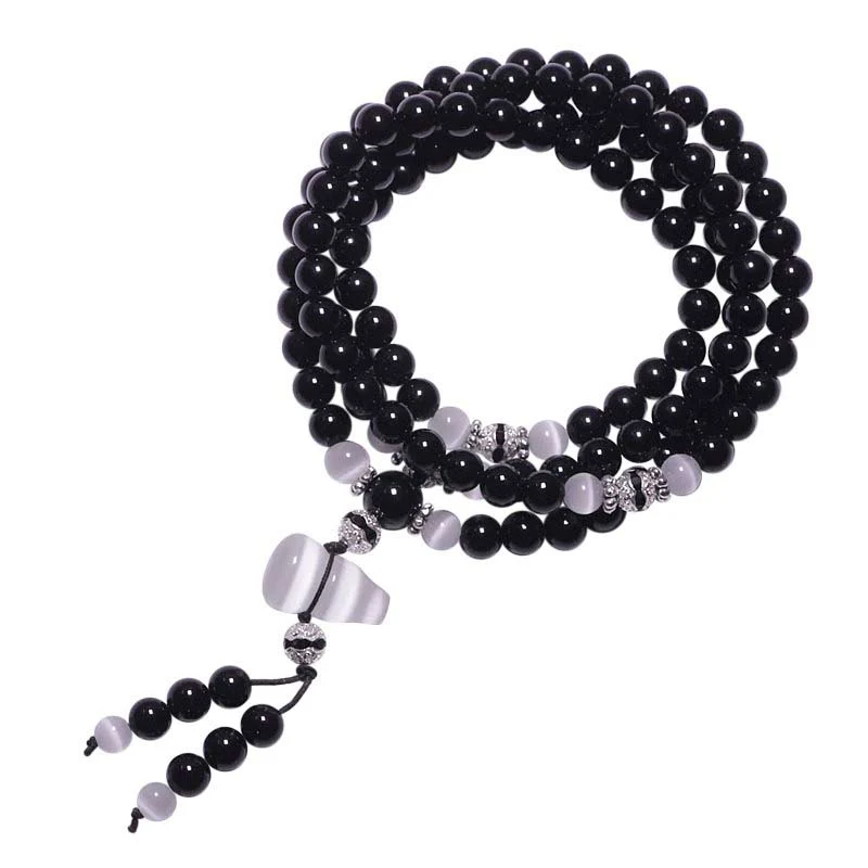 Braccialetto di meditazione con perline di cristallo bianco e onice nero Buddha Stones - Image 8
