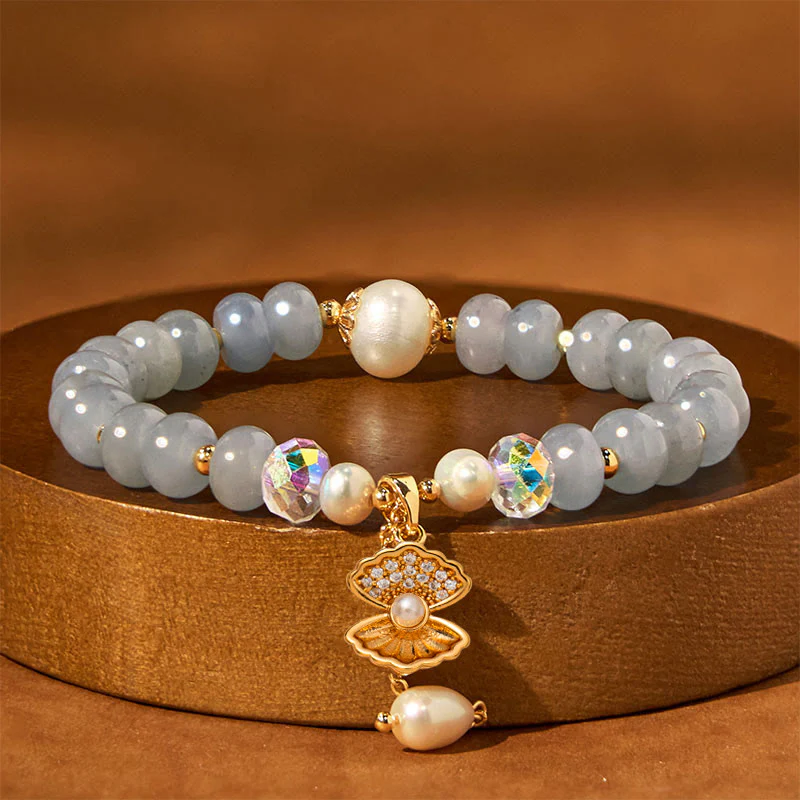 Braccialetto di perle curative in conchiglia di perle di acquamarina naturale Buddha Stones - Image 2