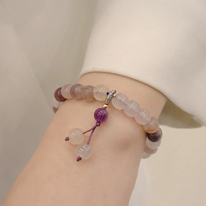 Braccialetto di perline con ciondolo a forma di fiore viola dorato naturale di seta Buddha Stones - Image 11