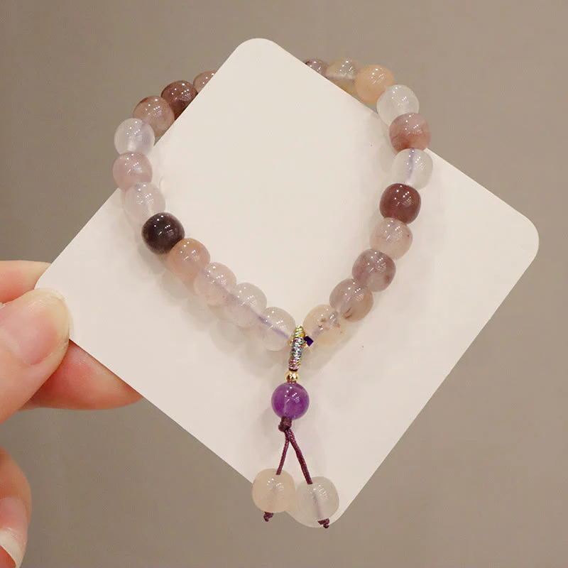 Braccialetto di perline con ciondolo a forma di fiore viola dorato naturale di seta Buddha Stones - Image 9