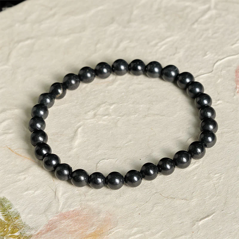 Braccialetto di perline con forza interiore in pietra di shungite autentica e rotonda Buddha Stones - Image 2