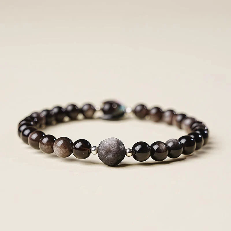 Braccialetto di perline di protezione in ossidiana lucida d'argento naturale con design a luna Buddha Stones - Image 2