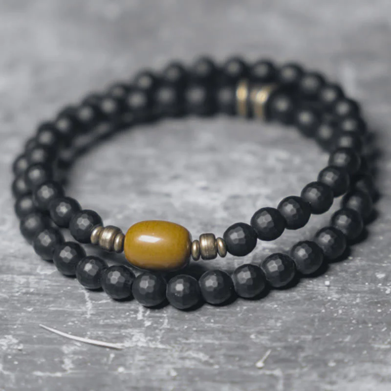 Braccialetto di protezione a doppio giro con perline di onice nero e topazio con superficie tagliata smerigliata Buddha Stones