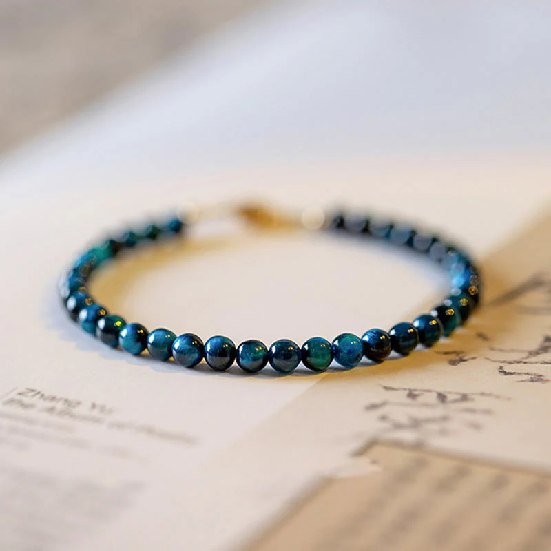 Braccialetto di protezione con catena in pietra naturale occhio di tigre blu Buddha Stones