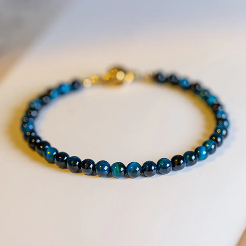 Braccialetto di protezione con catena in pietra naturale occhio di tigre blu Buddha Stones - Image 11