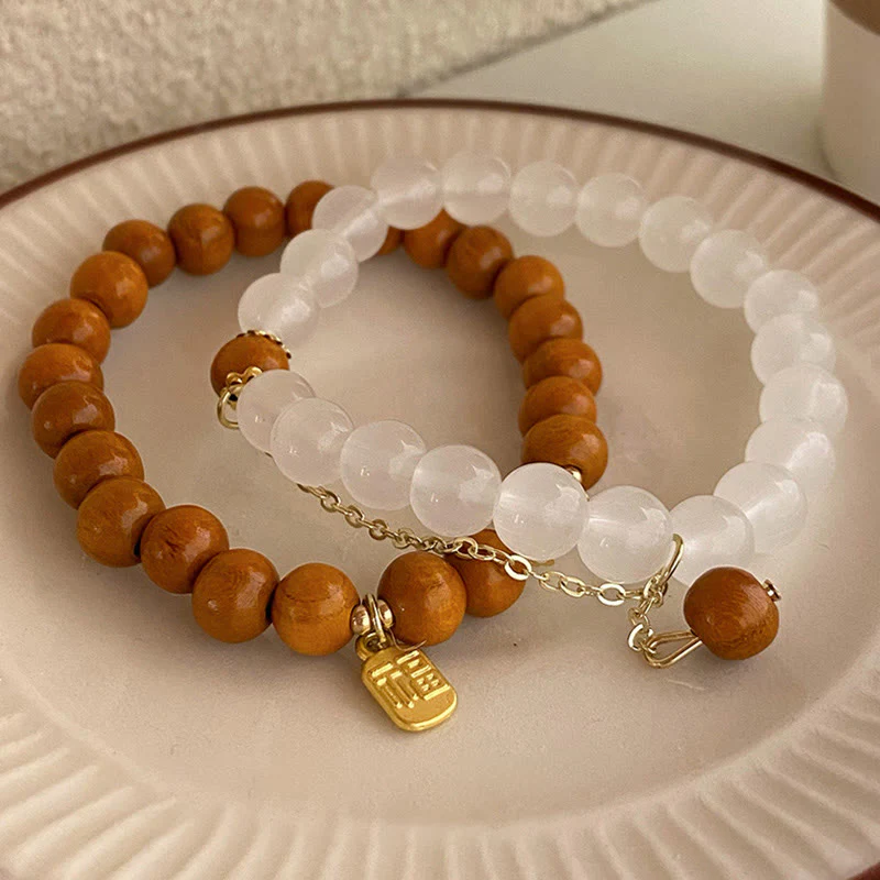 Braccialetto di protezione con ciondolo a forma di carattere Fu con occhio di gatto Buddha Stones in legno di sandalo - Image 2