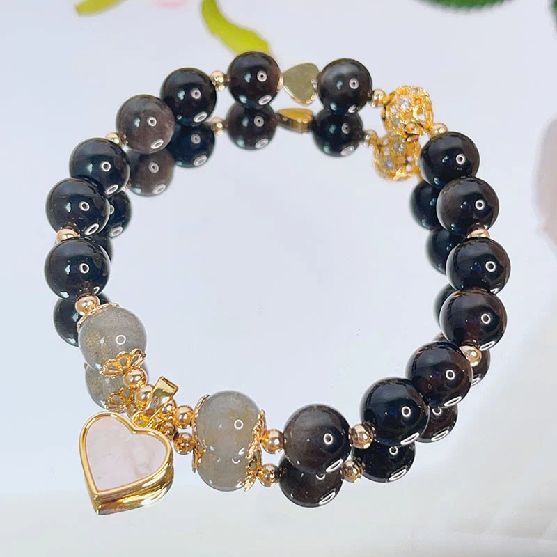 Braccialetto di protezione con cuore, stella e fiore in ossidiana naturale con Buddha Stones argento lucido