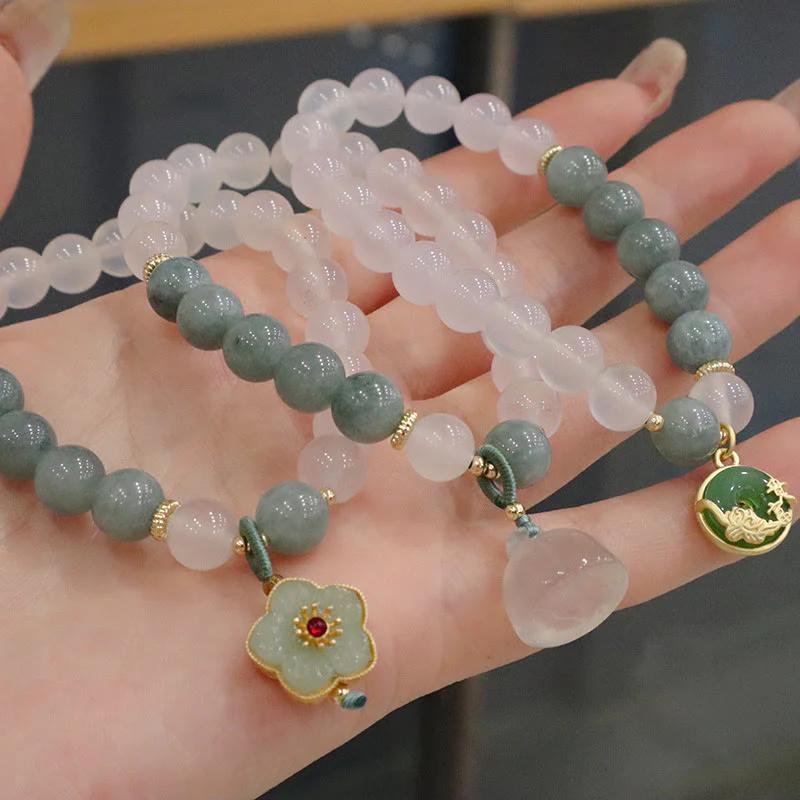 Braccialetto di protezione con fibbia della pace, fiore di loto, agata bianca e giada Buddha Stones