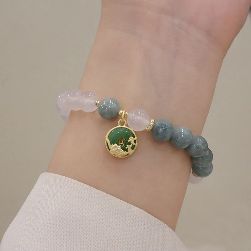 Braccialetto di protezione con fibbia della pace, fiore di loto, agata bianca e giada Buddha Stones - Image 10