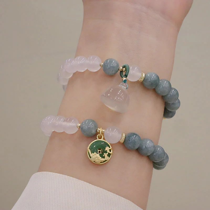 Braccialetto di protezione con fibbia della pace, fiore di loto, agata bianca e giada Buddha Stones - Image 13
