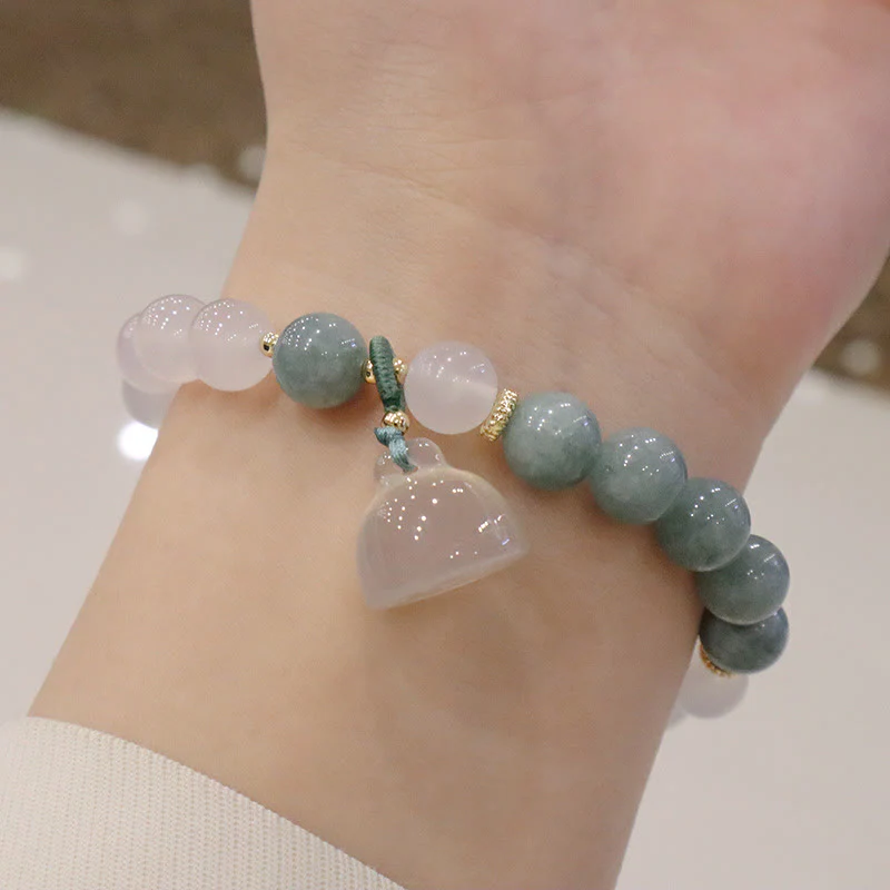 Braccialetto di protezione con fibbia della pace, fiore di loto, agata bianca e giada Buddha Stones - Image 4