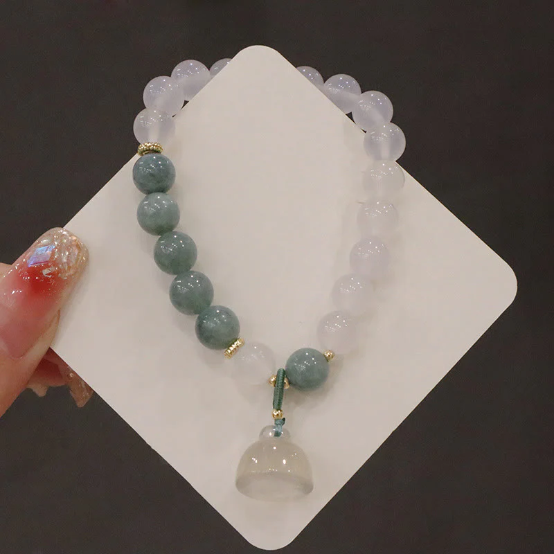 Braccialetto di protezione con fibbia della pace, fiore di loto, agata bianca e giada Buddha Stones - Image 5