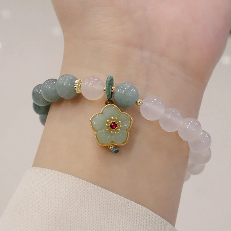 Braccialetto di protezione con fibbia della pace, fiore di loto, agata bianca e giada Buddha Stones - Image 7
