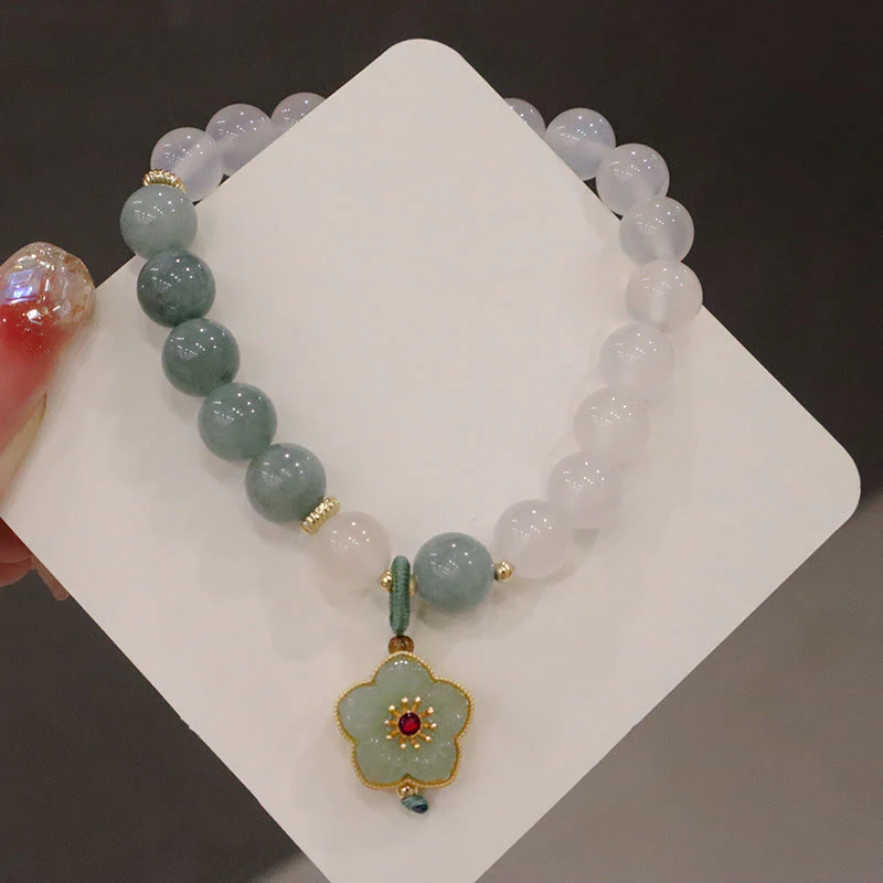 Braccialetto di protezione con fibbia della pace, fiore di loto, agata bianca e giada Buddha Stones - Image 8