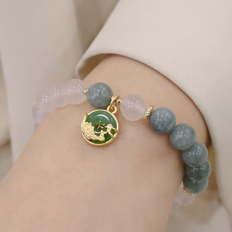 Braccialetto di protezione con fibbia della pace, fiore di loto, agata bianca e giada Buddha Stones - Image 9