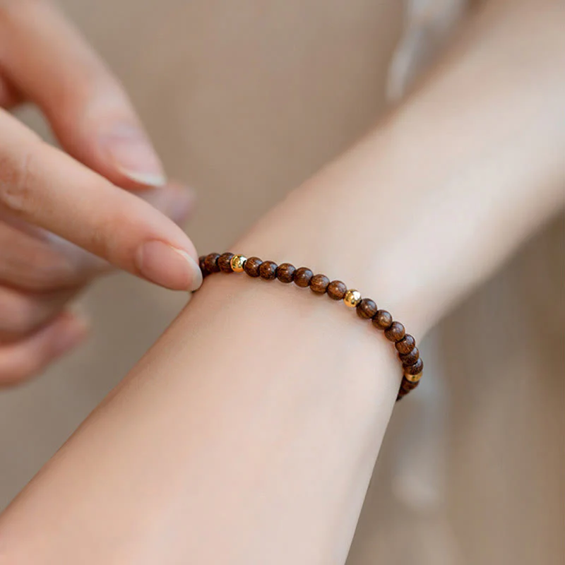Braccialetto di protezione con perline di rame placcate in oro 14K e legno di sandalo ultrasottile da 4 mm Buddha Stones - Image 5